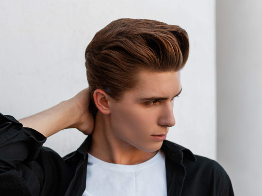 Modern Slicked-back Men's Haircut